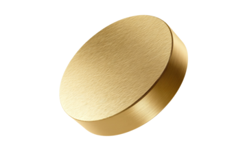 A gold colored coin with a shiny surface