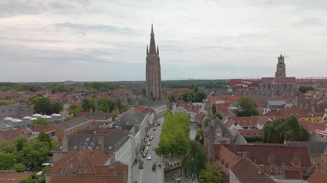 Belgium Brugge Onze Lieve Vrouwekerk Drone forwards Cloudy day