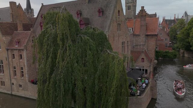 Belgium Brugge Rosary Quay Drone Left reveal Cloudy day