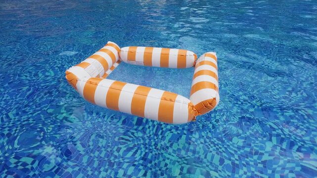 The inflatable orange floating frame in the swimming pool