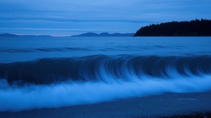 Fototapeta premium Ocean Wave Creates Stunning Blue Landscape at dusk Time in Sea