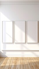Fototapeta premium Three empty white frames on a light beige wall, showcasing a bright and airy interior design.