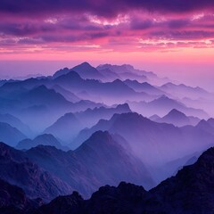 Majestic mountain range at dawn, soft purple-blue hues