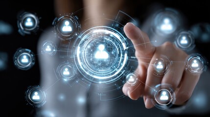 Fototapeta premium A person's hand interacts with a digital interface, showcasing futuristic elements like user icons and data connections, symbolizing technology and human connectivity in modern soc