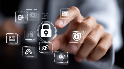 A close-up of a hand interacting with a digital interface, showcasing security and data protection icons. Emphasizes the importance of cybersecurity in modern technology.