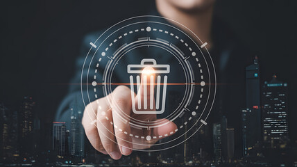 Business professional using digital interface to delete data on futuristic city background