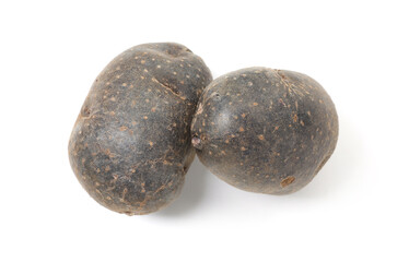 Fresh purple potatoes isolated on white, top view
