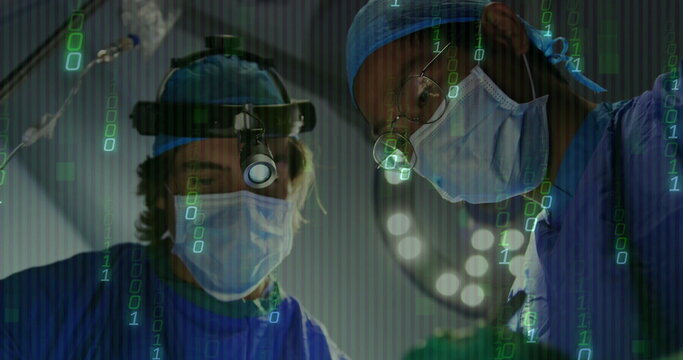 Leaning two surgeons with headlamps performing surgery in OR, with green binary code overlay - Powered by Adobe