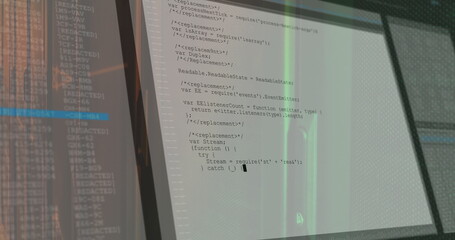 Displaying dual monitors showing JavaScript code editor windows on office desk, with thin bezels