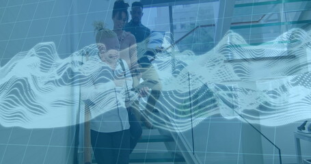 Descending blonde mid-adult woman in white blouse walking down office stairwell, digital wave