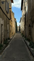 Fototapeta premium Looking down the street in old town of Avignon France