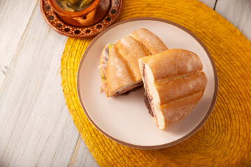 Mexican ham sandwich, in Mexico it is called Torta de Jamon, it is the most popular of the Mexican Tortas and the recipe varies depending on who prepares it, made with bolillo or telera bread.