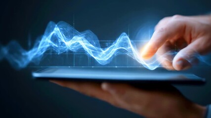 Hand interacting with a digital tablet, displaying glowing wave patterns, symbolizing technology use - Powered by Adobe