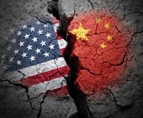 A fractured earth, contrasting the flags of the USA and China, depicts a strained international relationship.