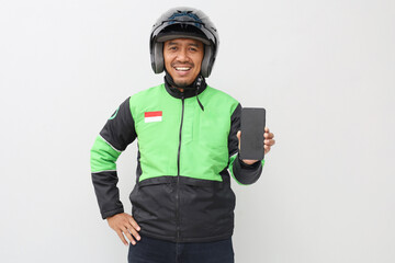 Asian online taxi driver motorbike wearing green jacket showing blank screen of mobile phone