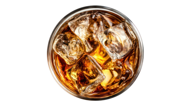Top-down view of a glass of iced amber-colored liquid
