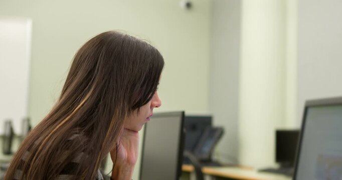 Woman surfing internet on lab computer 4k