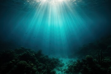 Fototapeta premium Sunlit Depths: A mesmerizing underwater scene showcases radiant sunbeams piercing through the deep blue, illuminating a vibrant coral reef.