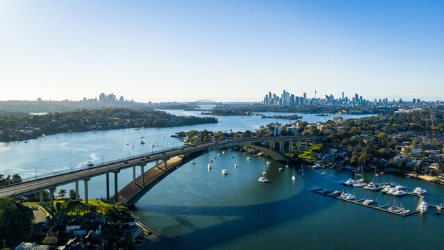 Sydney City Skyline with Gladesville Bridge over Parramatta River