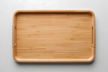 Fototapeta premium Overhead studio shot of a light brown wooden tray with handles in a minimalist style setting