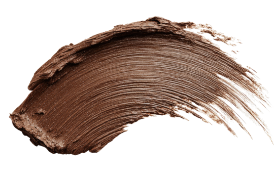Close-up of a smudged, light brown makeup product, swirled and textured on a black background