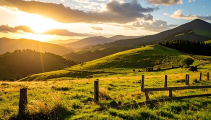 Fototapeta premium Sunset over grassy hills