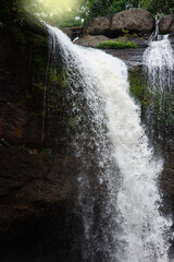 Beautiful natural waterfall with fairy lights