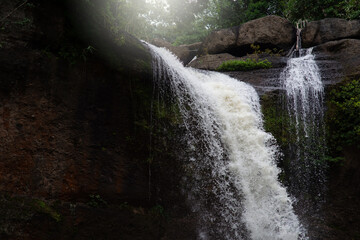 Beautiful natural waterfall with fairy lights