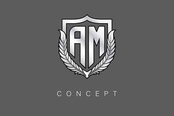 AM Creative Initial Letter Logo with Shield and Laurel Wreath Silver Metallic Branding Emblem on Gray Background.