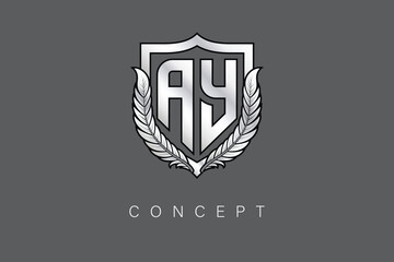 AY Creative Initial Letter Logo with Shield and Laurel Wreath Silver Metallic Branding Emblem on Gray Background.