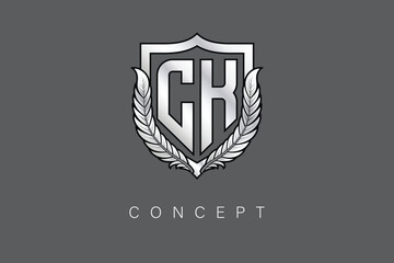 CK Creative Initial Letter Logo with Shield and Laurel Wreath Silver Metallic Branding Emblem on Gray Background.