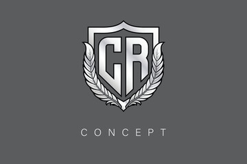CR Creative Initial Letter Logo with Shield and Laurel Wreath Silver Metallic Branding Emblem on Gray Background.