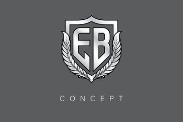 EB Creative Initial Letter Logo with Shield and Laurel Wreath Silver Metallic Branding Emblem on Gray Background.