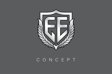 EE Creative Initial Letter Logo with Shield and Laurel Wreath Silver Metallic Branding Emblem on Gray Background.