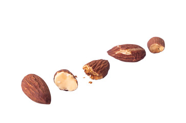 a collection of almond slices and whole almonds isolated on a white background