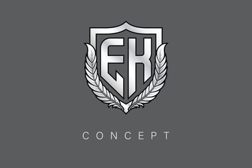 EK Creative Initial Letter Logo with Shield and Laurel Wreath Silver Metallic Branding Emblem on Gray Background.