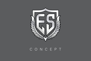 ES Creative Initial Letter Logo with Shield and Laurel Wreath Silver Metallic Branding Emblem on Gray Background.