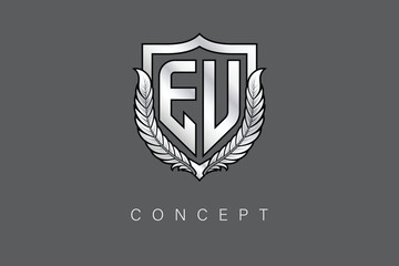 Obraz premium EU Creative Initial Letter Logo with Shield and Laurel Wreath Silver Metallic Branding Emblem on Gray Background.