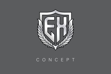 EX Creative Initial Letter Logo with Shield and Laurel Wreath Silver Metallic Branding Emblem on Gray Background.