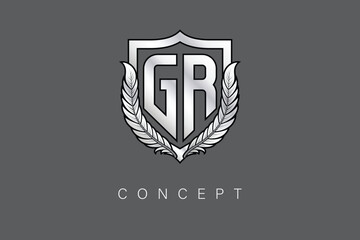 GR Creative Initial Letter Logo with Shield and Laurel Wreath Silver Metallic Branding Emblem on Gray Background.