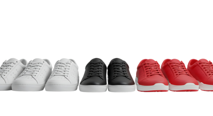 A colorful choice of classic sneakers in red, black, and white, showcasing a versatile collection of casual athletic footwear isolated on a clean studio background