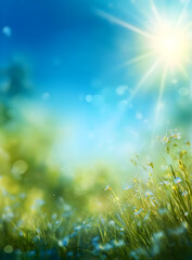 Obraz premium A vibrant, sunlit field with blooming flowers and lush greenery under a bright blue sky, evoking a sense of tranquility and freshness.