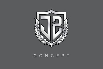 JZ Creative Initial Letter Logo with Shield and Laurel Wreath Silver Metallic Branding Emblem on Gray Background.