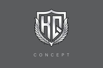 KQ Creative Initial Letter Logo with Shield and Laurel Wreath Silver Metallic Branding Emblem on Gray Background.