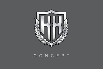 Obraz premium KX Creative Initial Letter Logo with Shield and Laurel Wreath Silver Metallic Branding Emblem on Gray Background.