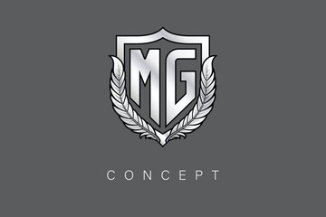 MG Creative Initial Letter Logo with Shield and Laurel Wreath Silver Metallic Branding Emblem on Gray Background.