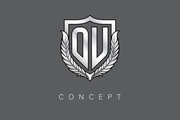 Obraz premium OU Creative Initial Letter Logo with Shield and Laurel Wreath Silver Metallic Branding Emblem on Gray Background.
