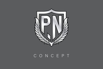 PN Creative Initial Letter Logo with Shield and Laurel Wreath Silver Metallic Branding Emblem on Gray Background.