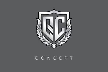 QC Creative Initial Letter Logo with Shield and Laurel Wreath Silver Metallic Branding Emblem on Gray Background.