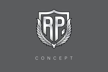 RP Creative Initial Letter Logo with Shield and Laurel Wreath Silver Metallic Branding Emblem on Gray Background.